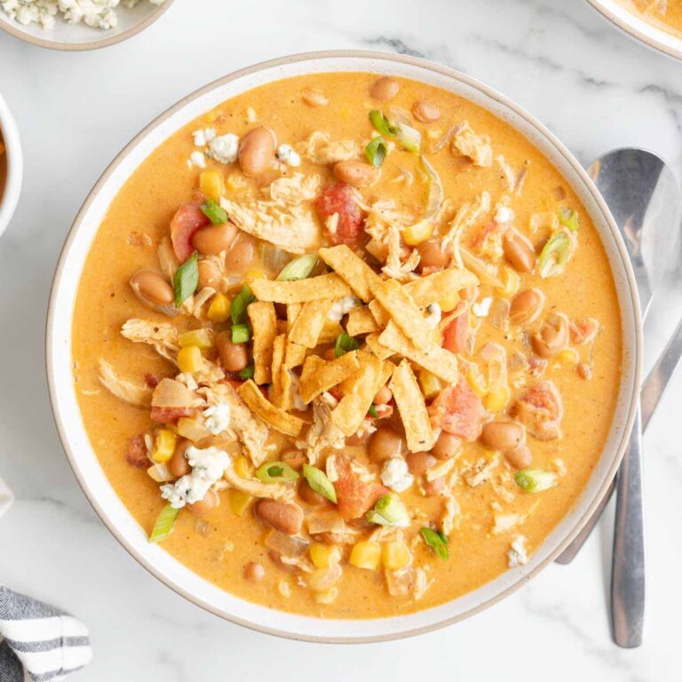 Craving the hearty warmth of chili with a spicy twist? This Buffalo Chicken Chili combines zesty buffalo flavor with tender chicken and creamy beans, creating a cozy bowl that’s sure to heat up your taste buds and become a new game-day favorite! This recipe is loaded with pinto beans, cream cheese, celery, chicken breast, corn, Buffalo sauce and diced tomatoes.