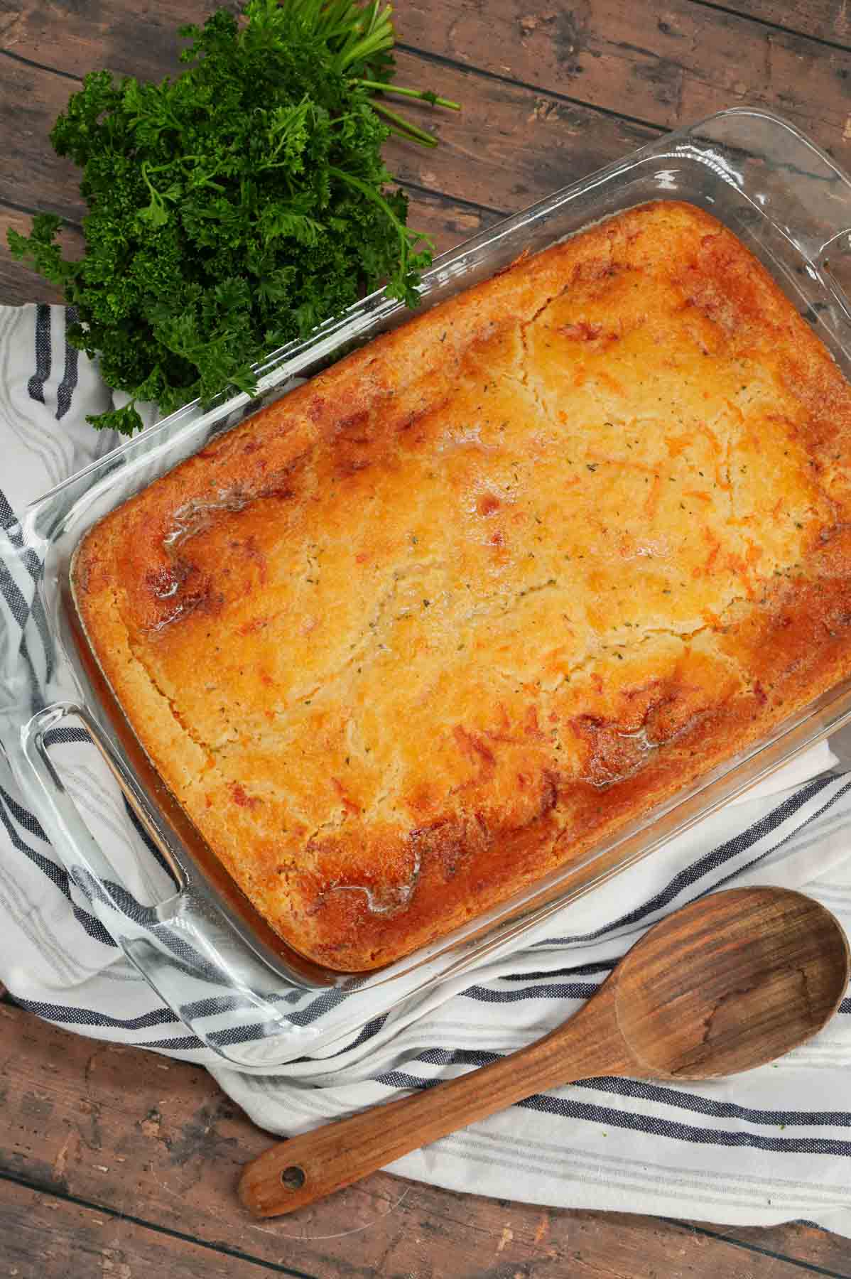 Cheddar Bay Ground Beef Cobbler is a hearty casserole recipe with a creamy and cheesy ground beef base and a Red Lobster Cheddar Bay Biscuit topping.
