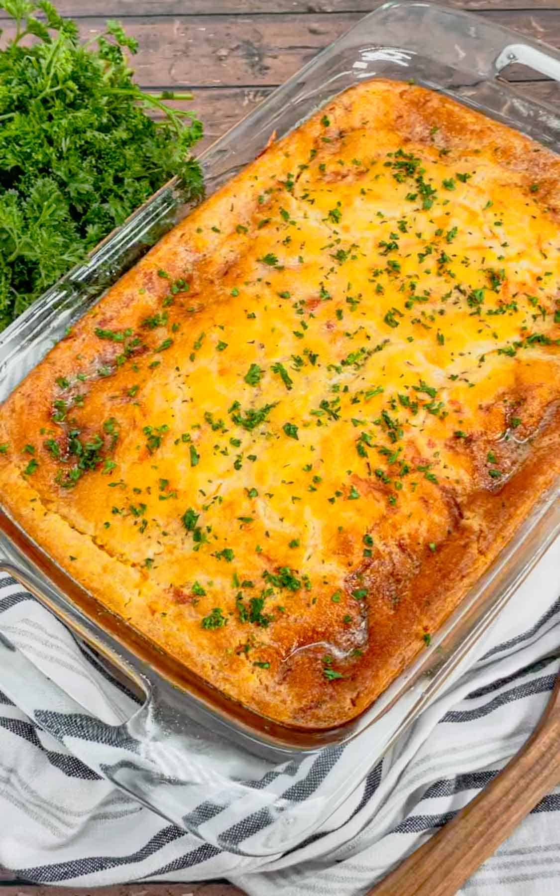 Cheddar Bay Ground Beef Cobbler is a hearty casserole recipe with a creamy and cheesy ground beef base and a Red Lobster Cheddar Bay Biscuit topping.