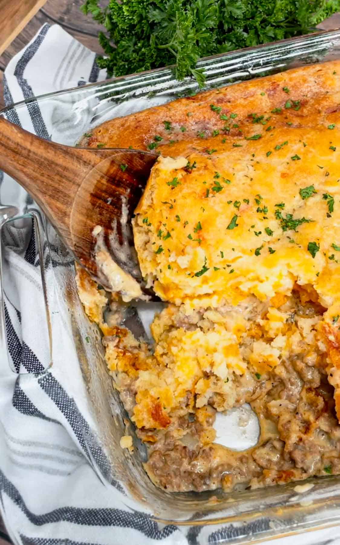 Cheddar Bay Ground Beef Cobbler is a hearty casserole recipe with a creamy and cheesy ground beef base and a Red Lobster Cheddar Bay Biscuit topping.
