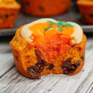 Halloween Sugar Cookie Brownies are a fun and tasty treat made in muffin tins with a dyed orange brownie base topped with Pillsbury Halloween sugar cookies.