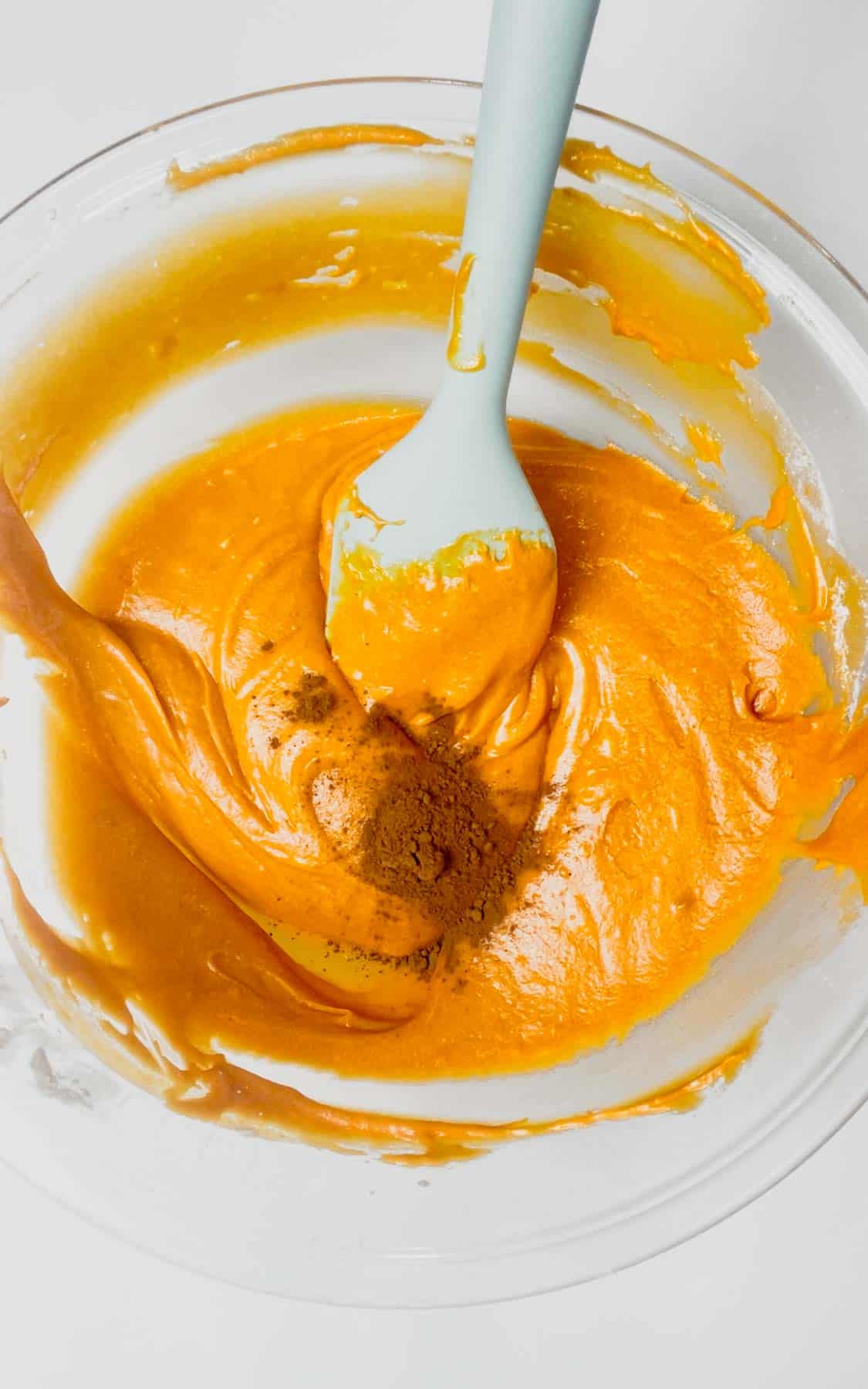 cocoa powder added to orange brownie batter