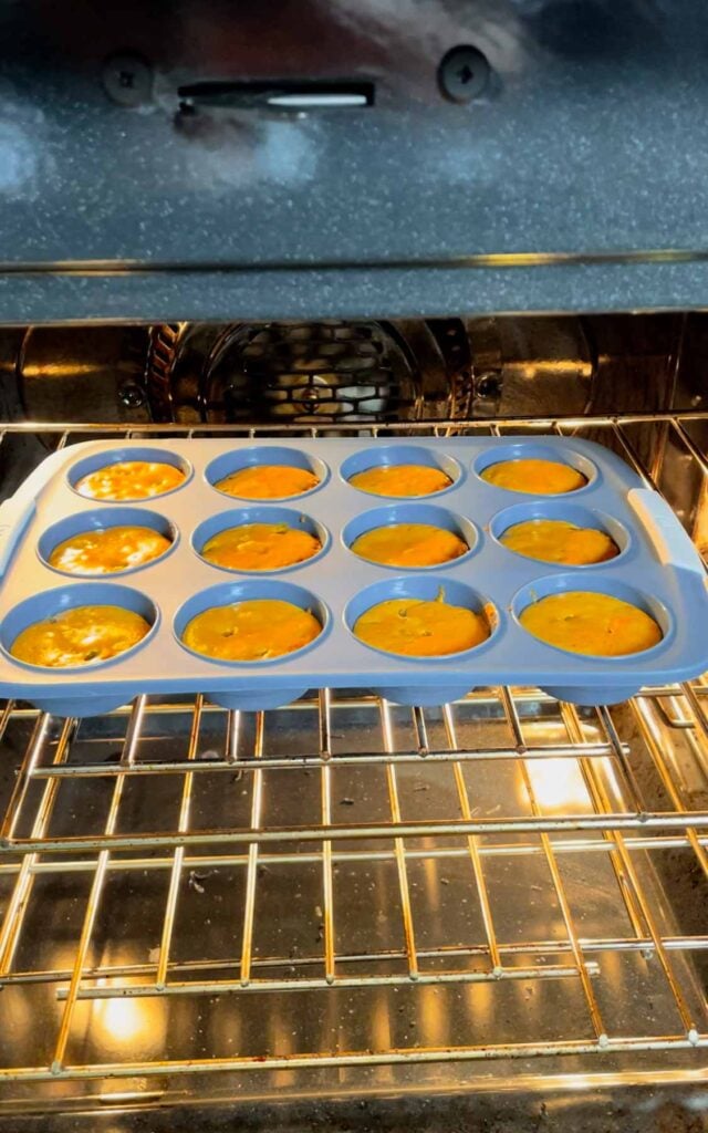orange Halloween brownies baking in the oven