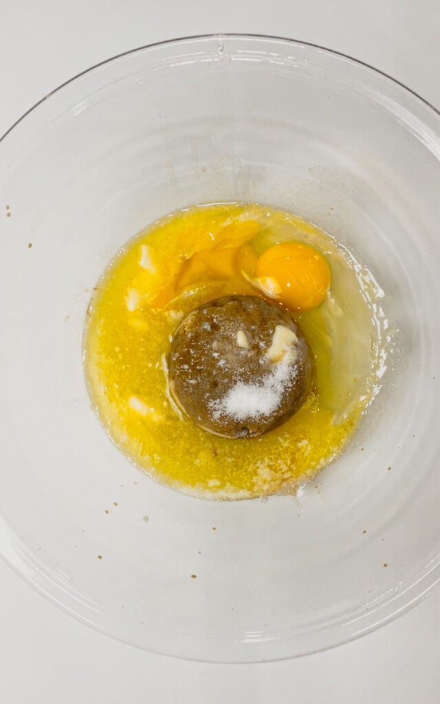 eggs, salt, brown sugar, melted butter and vanilla extract in a mixing bowl
