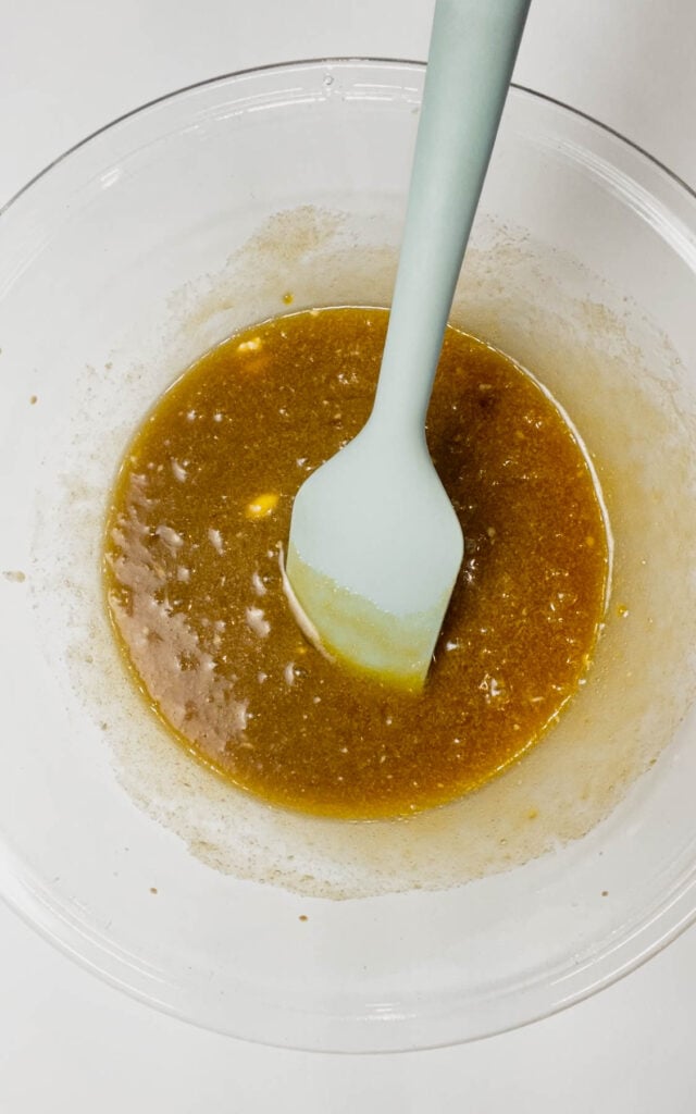 brown sugar, melted butter, vanilla, salt and egg mixture in a bowl.