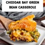 This isn't your grandma’s green bean casserole—it's even better! Made with a rich cheddar soup base, melty parmesan and cheddar, and finished with a golden, flaky Cheddar Bay Biscuit topping, this dish is comfort food at its finest! 😍🍽️ #CheesyGoodness #HolidayFeast #SideDishPerfection #FoodieFaves