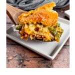 This isn't your grandma’s green bean casserole—it's even better! Made with a rich cheddar soup base, melty parmesan and cheddar, and finished with a golden, flaky Cheddar Bay Biscuit topping, this dish is comfort food at its finest! 😍🍽️ #CheesyGoodness #HolidayFeast #SideDishPerfection #FoodieFaves