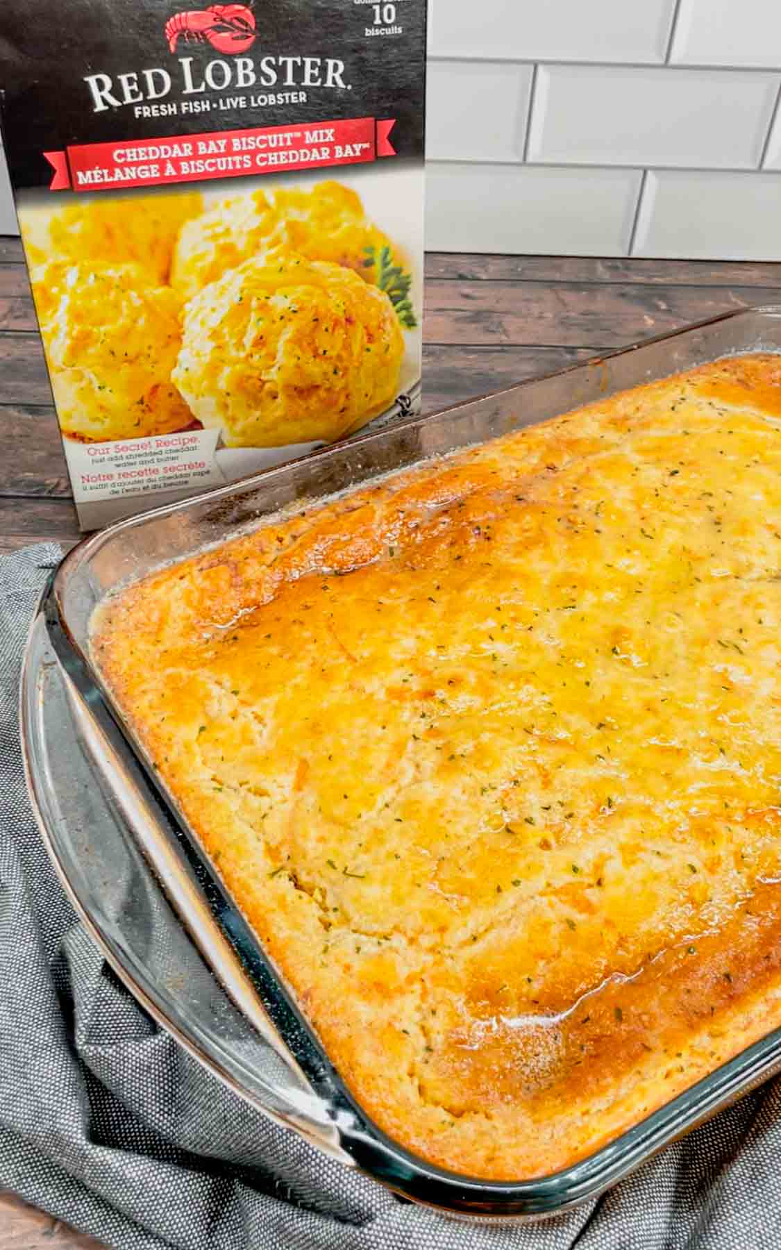 Take your holiday side dish game to the next level with this Cheddar Bay Green Bean Casserole—a creamy, cheesy twist with an irresistible biscuit topping that'll have everyone coming back for seconds! This hearty green bean casserole is loaded with cheddar soup, shredded parmesan and shredded cheddar cheese all covered with a layer Red Lobster Cheddar Bay Biscuits.