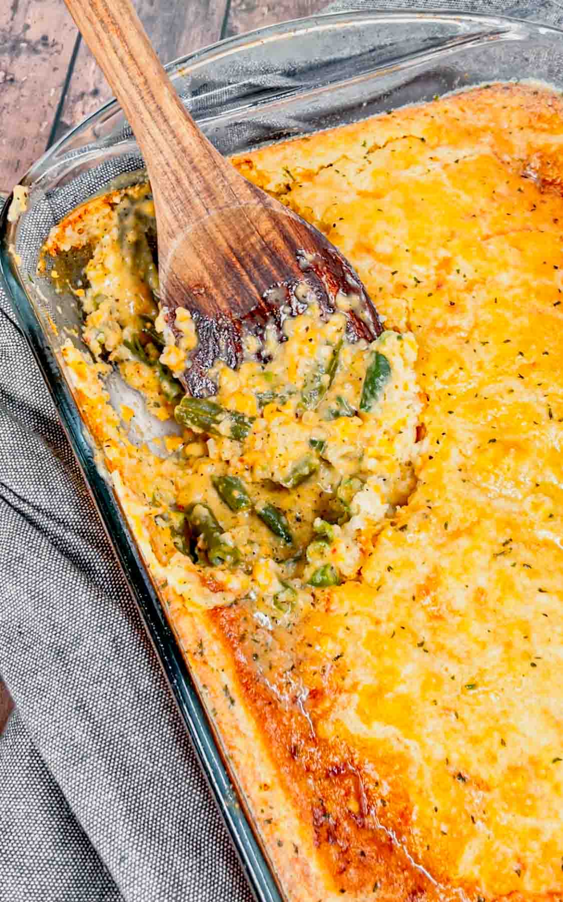 Take your holiday side dish game to the next level with this Cheddar Bay Green Bean Casserole—a creamy, cheesy twist with an irresistible biscuit topping that'll have everyone coming back for seconds! This hearty green bean casserole is loaded with cheddar soup, shredded parmesan and shredded cheddar cheese all covered with a layer Red Lobster Cheddar Bay Biscuits.