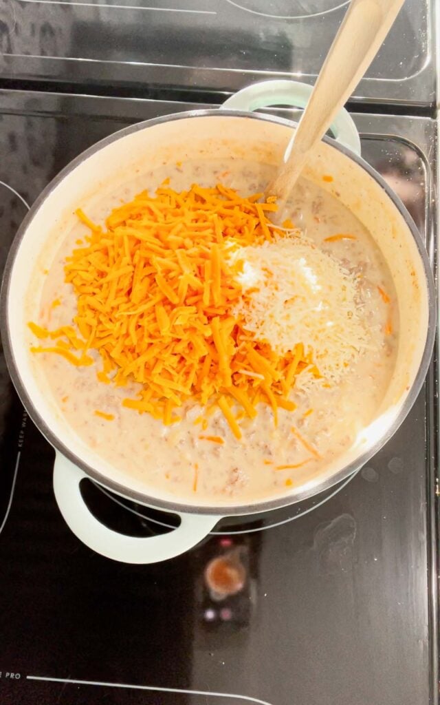 shredded cheese and parmesan cheese added to cheeseburger macaroni soup