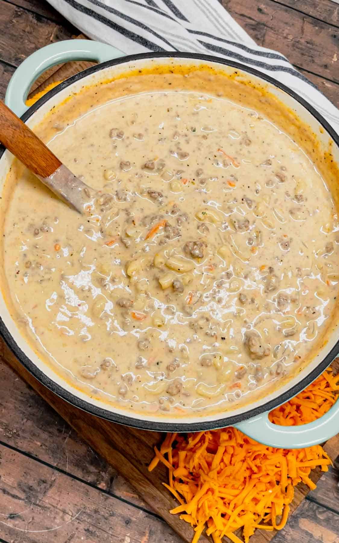 If you love the flavors of a classic cheeseburger, this creamy, cheesy Cheeseburger Macaroni Soup will become your new favorite comfort food—ready in just one pot and guaranteed to satisfy every craving! This hearty soup is loaded with ground beef, matchstick carrots, macaroni noodles, cheddar cheese, parmesan cheese, chicken broth and heavy cream.