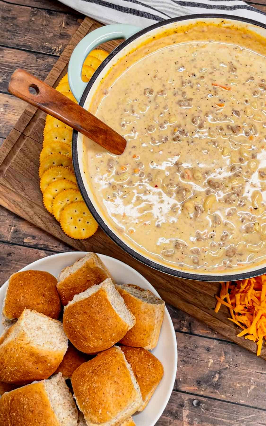 If you love the flavors of a classic cheeseburger, this creamy, cheesy Cheeseburger Macaroni Soup will become your new favorite comfort food—ready in just one pot and guaranteed to satisfy every craving! This hearty soup is loaded with ground beef, matchstick carrots, macaroni noodles, cheddar cheese, parmesan cheese, chicken broth and heavy cream.