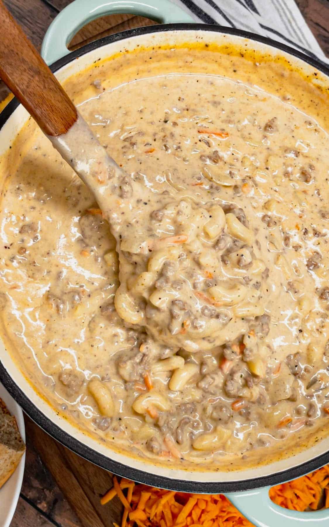 If you love the flavors of a classic cheeseburger, this creamy, cheesy Cheeseburger Macaroni Soup will become your new favorite comfort food—ready in just one pot and guaranteed to satisfy every craving! This hearty soup is loaded with ground beef, matchstick carrots, macaroni noodles, cheddar cheese, parmesan cheese, chicken broth and heavy cream.