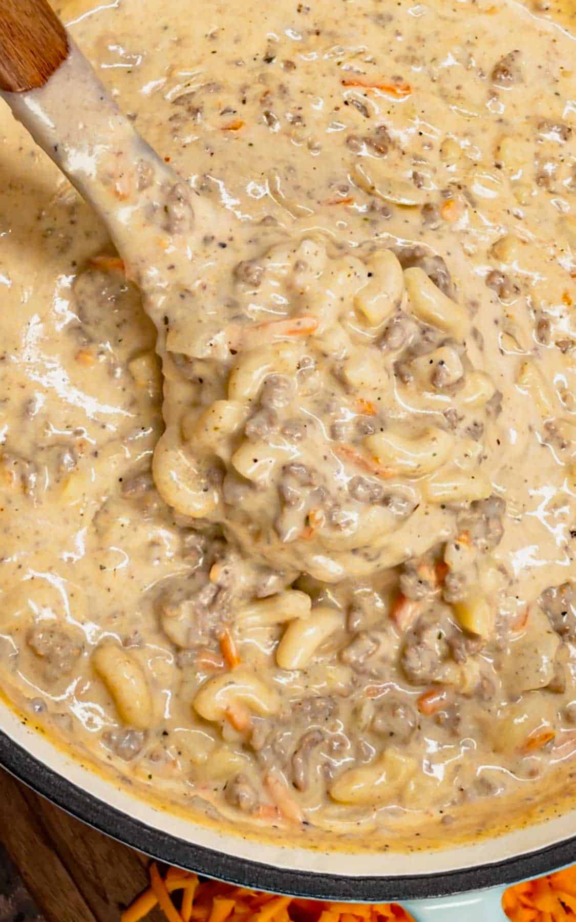 If you love the flavors of a classic cheeseburger, this creamy, cheesy Cheeseburger Macaroni Soup will become your new favorite comfort food—ready in just one pot and guaranteed to satisfy every craving! This hearty soup is loaded with ground beef, matchstick carrots, macaroni noodles, cheddar cheese, parmesan cheese, chicken broth and heavy cream.