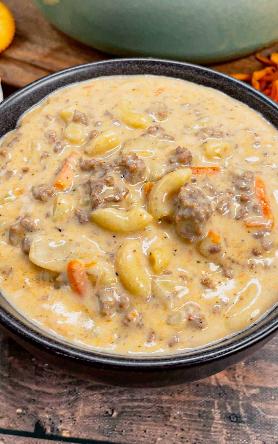 If you love the flavors of a classic cheeseburger, this creamy, cheesy Cheeseburger Macaroni Soup will become your new favorite comfort food—ready in just one pot and guaranteed to satisfy every craving! This hearty soup is loaded with ground beef, matchstick carrots, macaroni noodles, cheddar cheese, parmesan cheese, chicken broth and heavy cream.