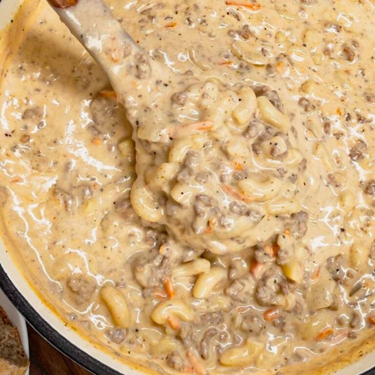 If you love the flavors of a classic cheeseburger, this creamy, cheesy Cheeseburger Macaroni Soup will become your new favorite comfort food—ready in just one pot and guaranteed to satisfy every craving! This hearty soup is loaded with ground beef, matchstick carrots, macaroni noodles, cheddar cheese, parmesan cheese, chicken broth and heavy cream.