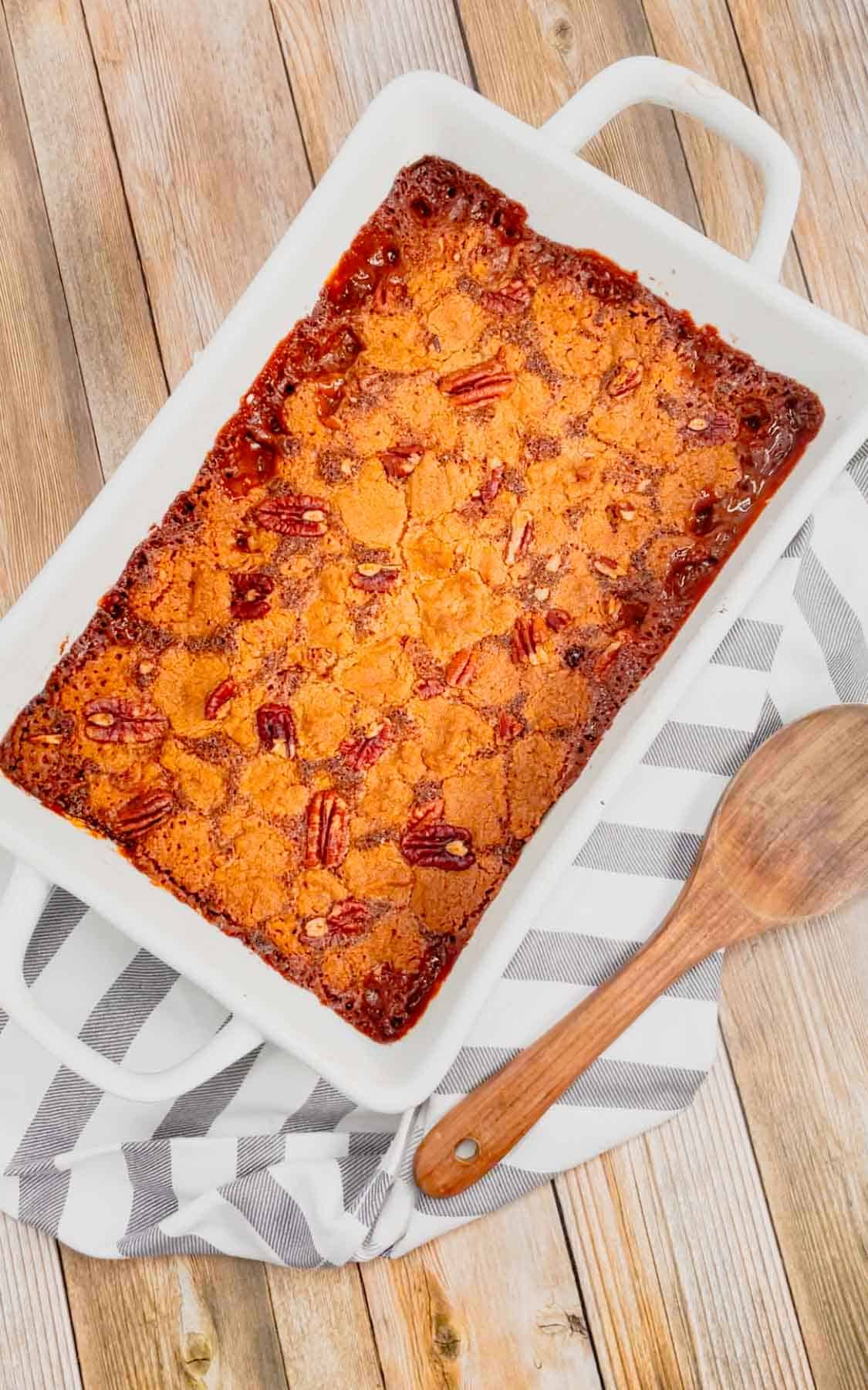 Get ready to dive into the ultimate comfort dessert—a warm, gooey peanut butter pecan pie cobbler that brings Southern charm and indulgence to your table in one irresistible bite! This decadent dessert is made with a pecan pie filling base loaded with Reese's peanut butter chips and topped with peanut butter cookie dough.