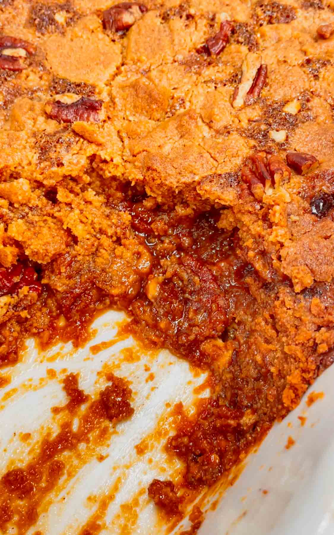 Get ready to dive into the ultimate comfort dessert—a warm, gooey peanut butter pecan pie cobbler that brings Southern charm and indulgence to your table in one irresistible bite! This decadent dessert is made with a pecan pie filling base loaded with Reese's peanut butter chips and topped with peanut butter cookie dough.
