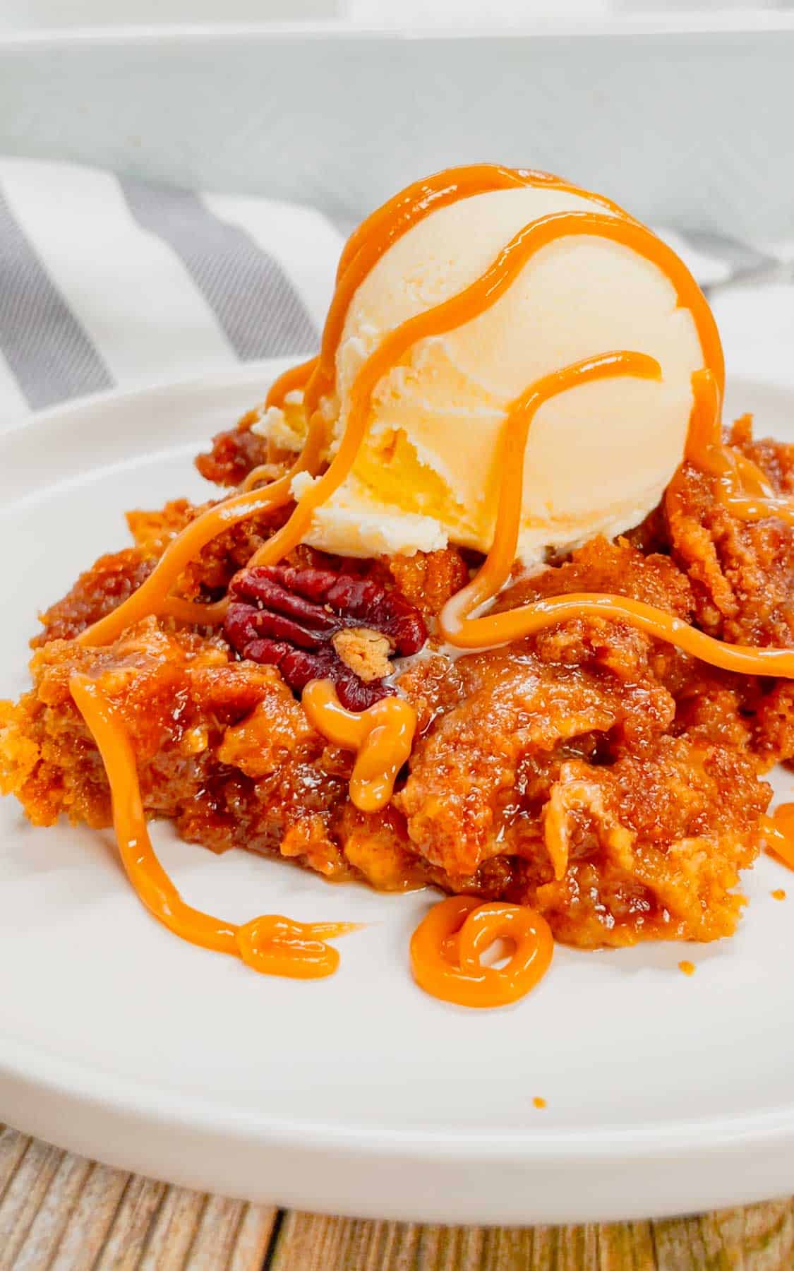 Get ready to dive into the ultimate comfort dessert—a warm, gooey peanut butter pecan pie cobbler that brings Southern charm and indulgence to your table in one irresistible bite! This decadent dessert is made with a pecan pie filling base loaded with Reese's peanut butter chips and topped with peanut butter cookie dough.