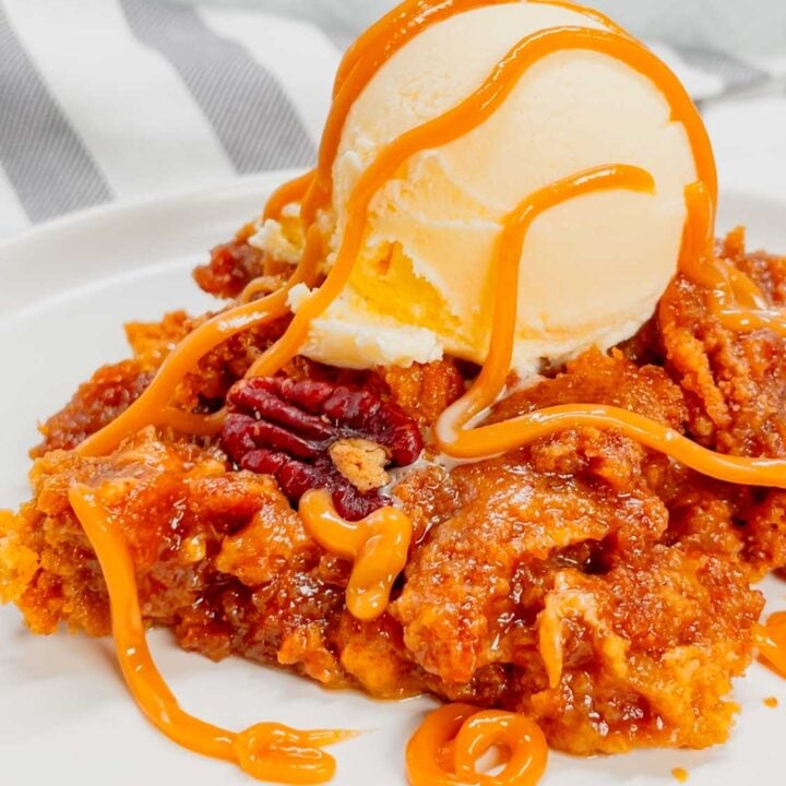 Get ready to dive into the ultimate comfort dessert—a warm, gooey peanut butter pecan pie cobbler that brings Southern charm and indulgence to your table in one irresistible bite! This decadent dessert is made with a pecan pie filling base loaded with Reese's peanut butter chips and topped with peanut butter cookie dough.