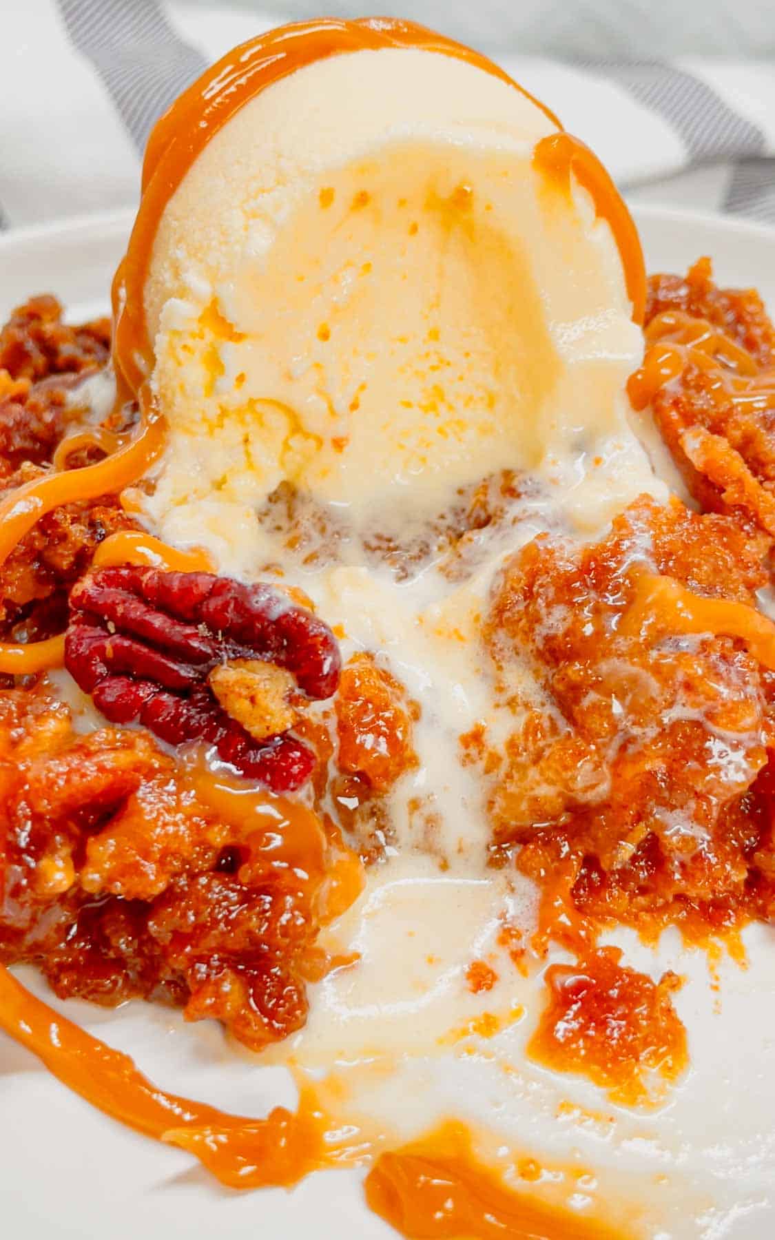 Get ready to dive into the ultimate comfort dessert—a warm, gooey peanut butter pecan pie cobbler that brings Southern charm and indulgence to your table in one irresistible bite! This decadent dessert is made with a pecan pie filling base loaded with Reese's peanut butter chips and topped with peanut butter cookie dough.
