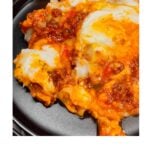 Love comfort food? This Sloppy Joe Shepherd’s Pie combines two favorites into one epic dish! Juicy ground beef, sautéed peppers and onions, all coated in a tangy homemade sloppy joe sauce, then topped with fluffy mashed potatoes, melty cheddar, and mozzarella. It’s a guaranteed family favorite! #ComfortFood #EasyDinner #CasseroleRecipe #GroundBeef