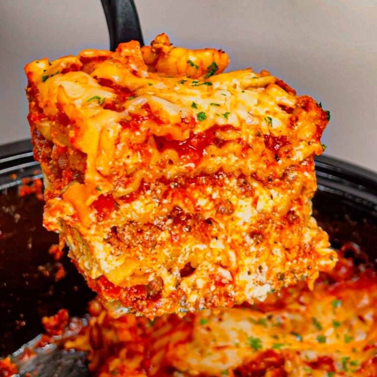 This Crock Pot lasagna is a game changer—layer after layer of savory, cheesy goodness that practically cooks itself! This hearty slower cooker dish is packed with ground beef, marinara, lasagna noodles, ricotta, Alfredo sauce, mozzarella and parmesan cheese.