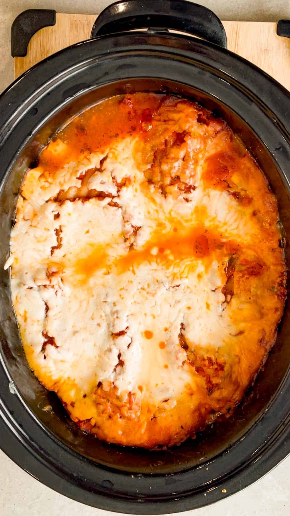 This Crock Pot lasagna is a game changer—layer after layer of savory, cheesy goodness that practically cooks itself! This hearty slower cooker dish is packed with ground beef, marinara, lasagna noodles, ricotta, Alfredo sauce, mozzarella and parmesan cheese.