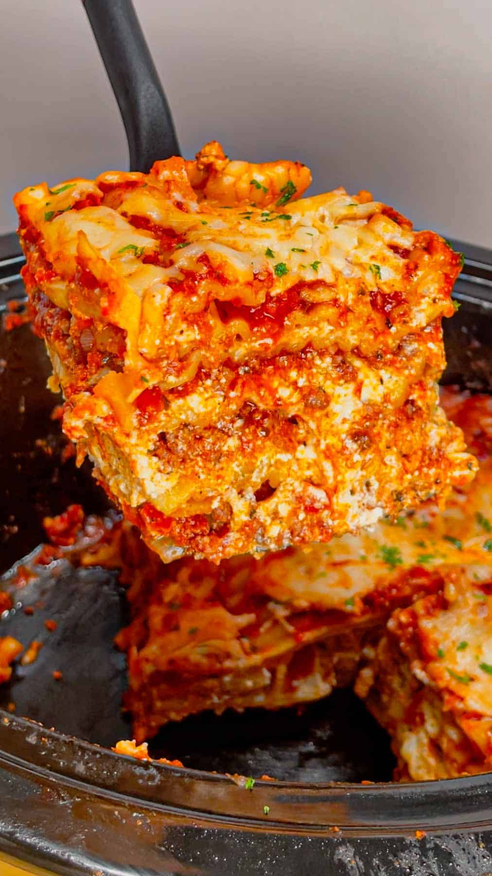 This Crock Pot lasagna is a game changer—layer after layer of savory, cheesy goodness that practically cooks itself! This hearty slower cooker dish is packed with ground beef, marinara, lasagna noodles, ricotta, Alfredo sauce, mozzarella and parmesan cheese.