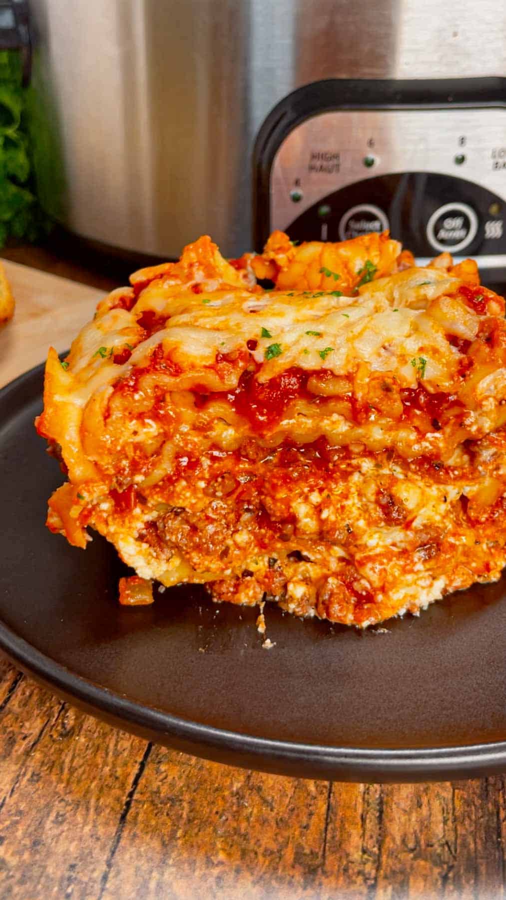 This Crock Pot lasagna is a game changer—layer after layer of savory, cheesy goodness that practically cooks itself! This hearty slower cooker dish is packed with ground beef, marinara, lasagna noodles, ricotta, Alfredo sauce, mozzarella and parmesan cheese.