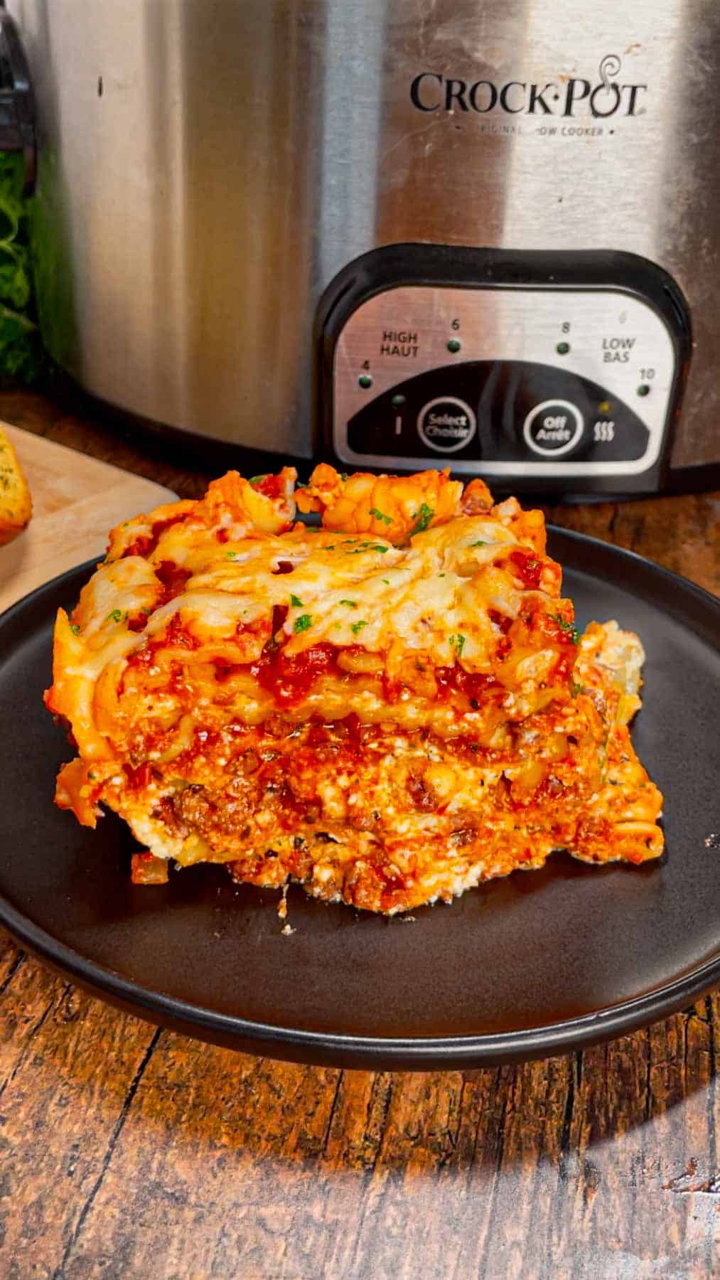 This Crock Pot lasagna is a game changer—layer after layer of savory, cheesy goodness that practically cooks itself! This hearty slower cooker dish is packed with ground beef, marinara, lasagna noodles, ricotta, Alfredo sauce, mozzarella and parmesan cheese.