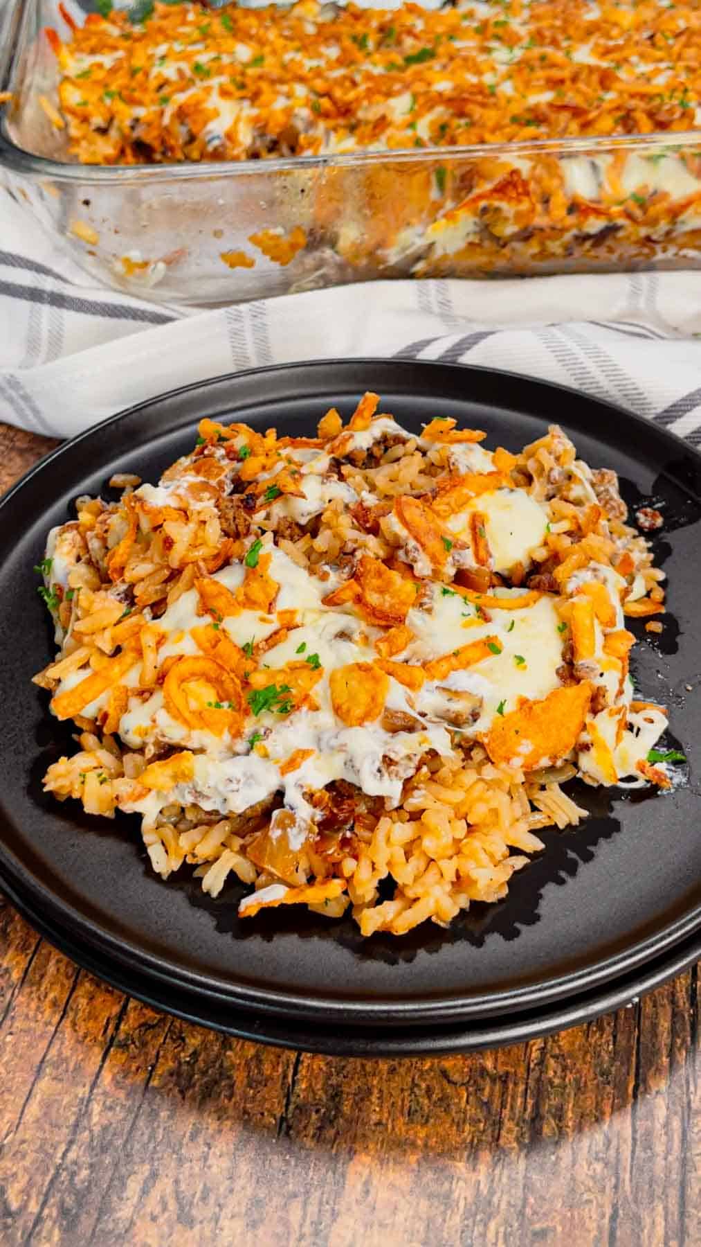 French Onion Ground Beef and Rice Casserole is a hearty dish loaded with instant rice, ground beef, diced onions, onion soup mix, beef broth, sour cream, mozzarella cheese and crispy fried onions.