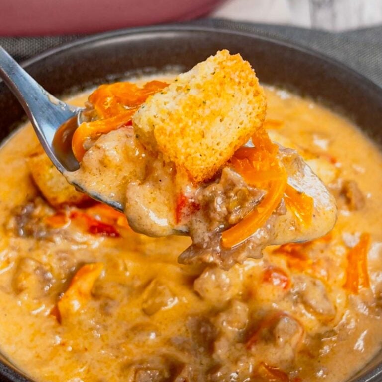 Warm, hearty, and irresistibly cheesy, this Roast Beef and Cheddar Soup is comfort food perfection in a bowl! This creamy soup is loaded with chopped deli roast beef, diced onions, red bell peppers and cheddar cheese.