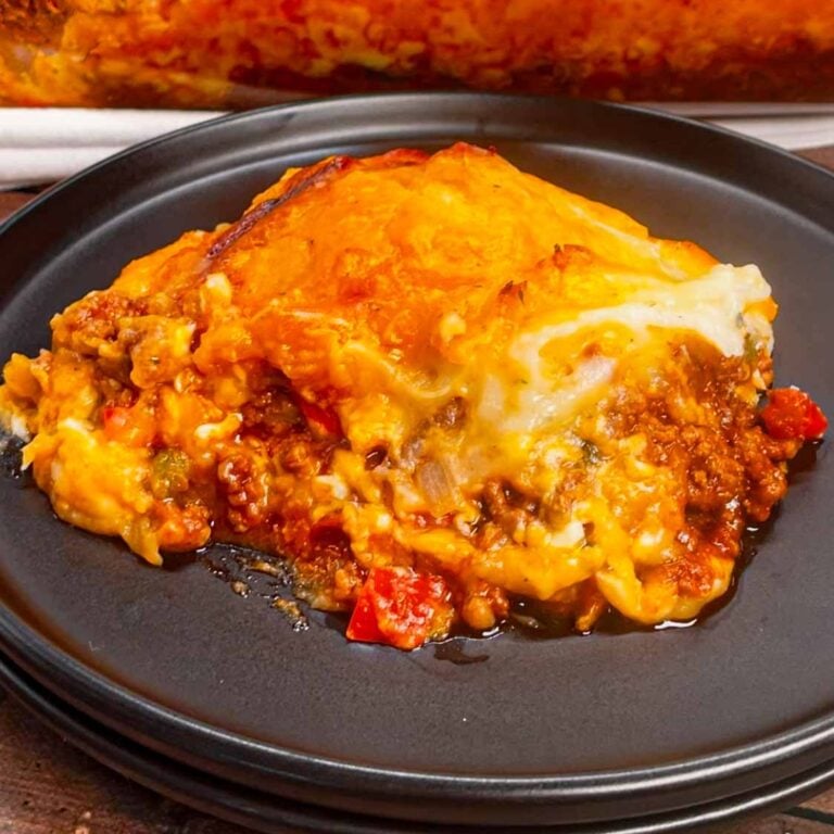 Transform two comfort food classics into one irresistible dish with this sloppy joe shepherd's pie—a hearty, savory mash-up that'll have everyone asking for seconds! This tasty dish is loaded with ground beef, diced peppers and onions all in tossed in a homemade sloppy joe sauce and topped with cheddar, mozzarella and mashed potatoes.