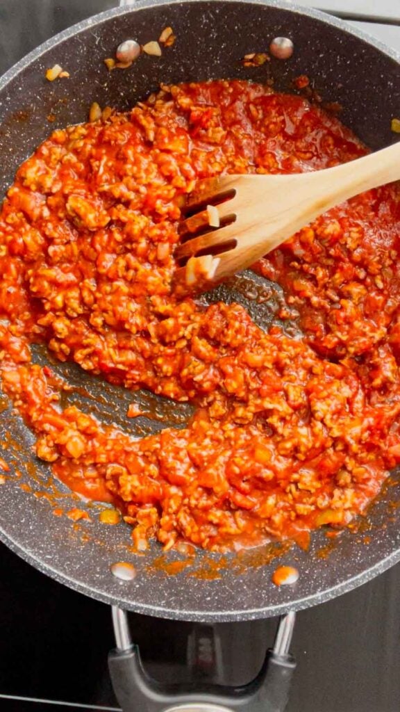 marinara and ground beef mixture in a skillet