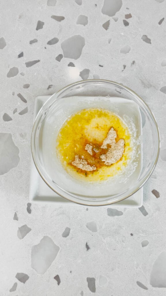 seasoning mix and melted butter in a small glass bowl
