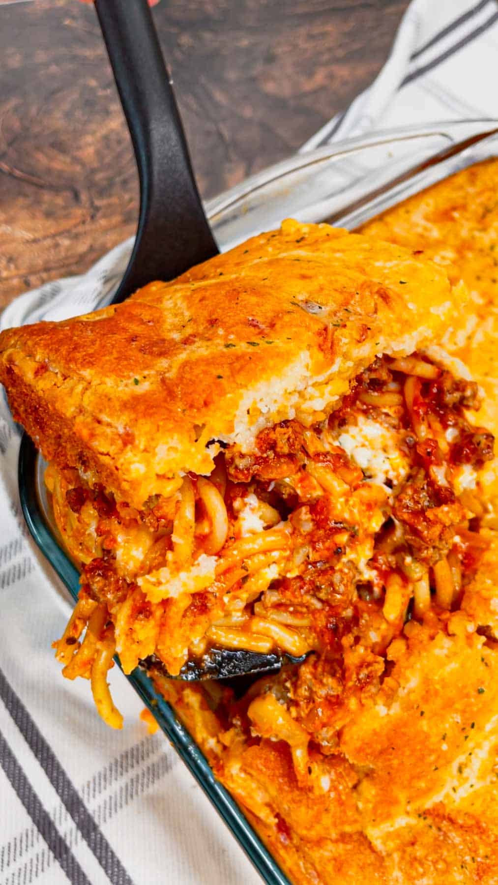 Take your comfort food game to the next level with this Cheddar Bay Spaghetti Casserole—where rich, cheesy pasta meets the buttery, garlicky goodness of those famous biscuits in one irresistible bake!

This hearty casserole is loaded with ground beef, marinara, ricotta, mozzarella and spaghetti noodles all topped with an irresistible fluffy layer of Cheddar Bay biscuit.