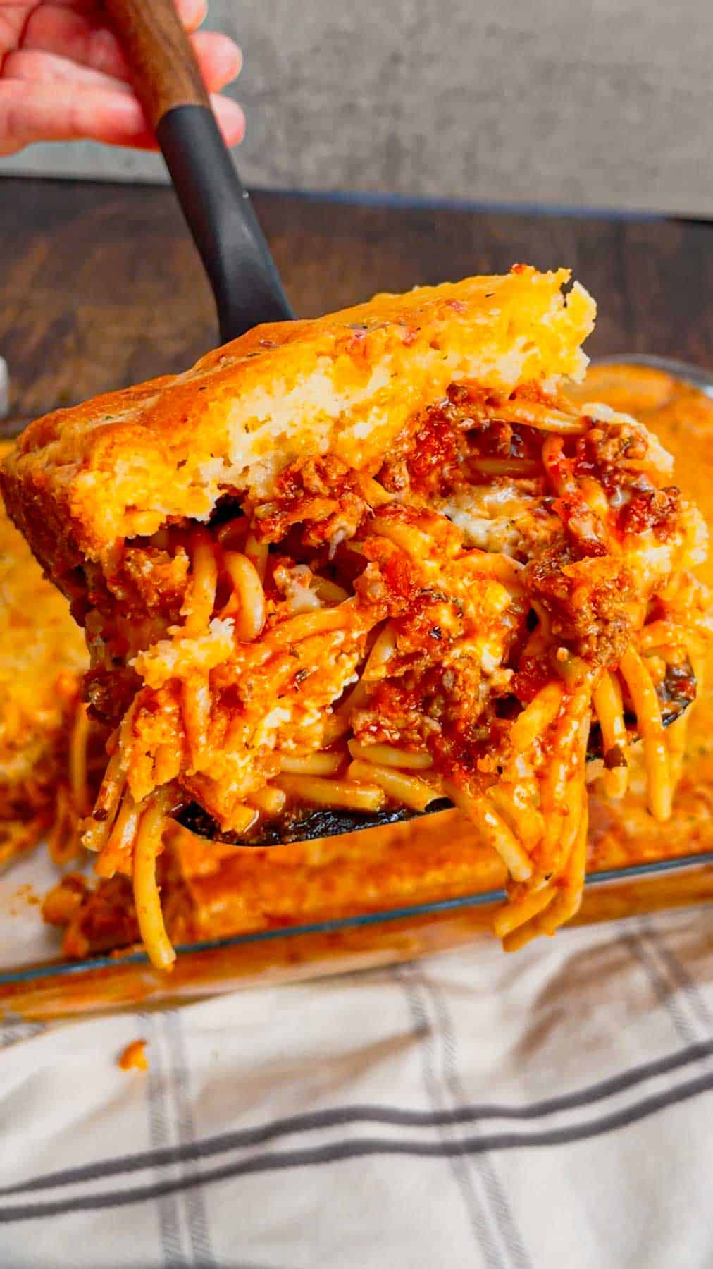 Take your comfort food game to the next level with this Cheddar Bay Spaghetti Casserole—where rich, cheesy pasta meets the buttery, garlicky goodness of those famous biscuits in one irresistible bake! This hearty casserole is loaded with ground beef, marinara, ricotta, mozzarella and spaghetti noodles all topped with an irresistible fluffy layer of Cheddar Bay biscuit.