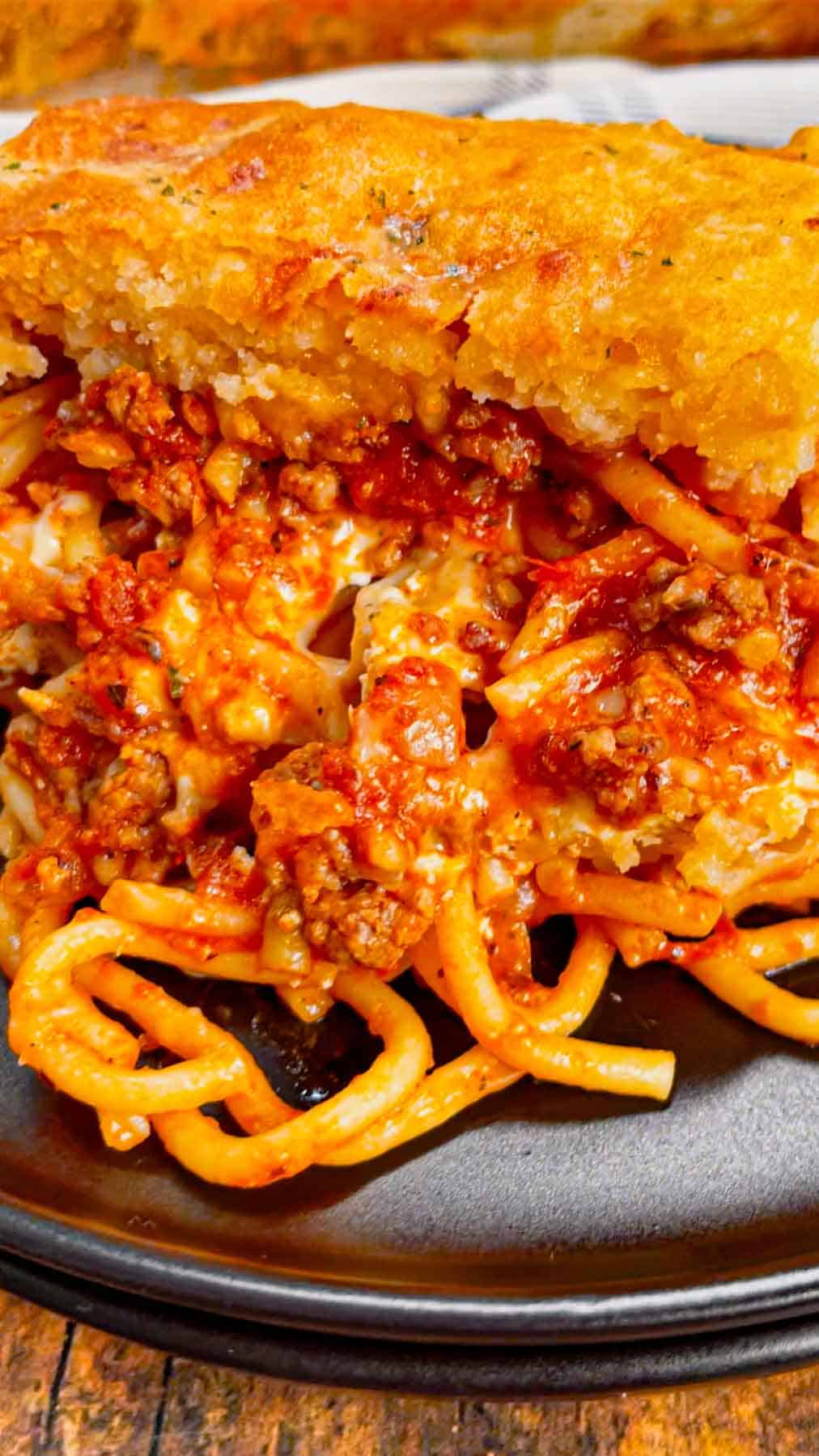 Take your comfort food game to the next level with this Cheddar Bay Spaghetti Casserole—where rich, cheesy pasta meets the buttery, garlicky goodness of those famous biscuits in one irresistible bake! This hearty casserole is loaded with ground beef, marinara, ricotta, mozzarella and spaghetti noodles all topped with an irresistible fluffy layer of Cheddar Bay biscuit.