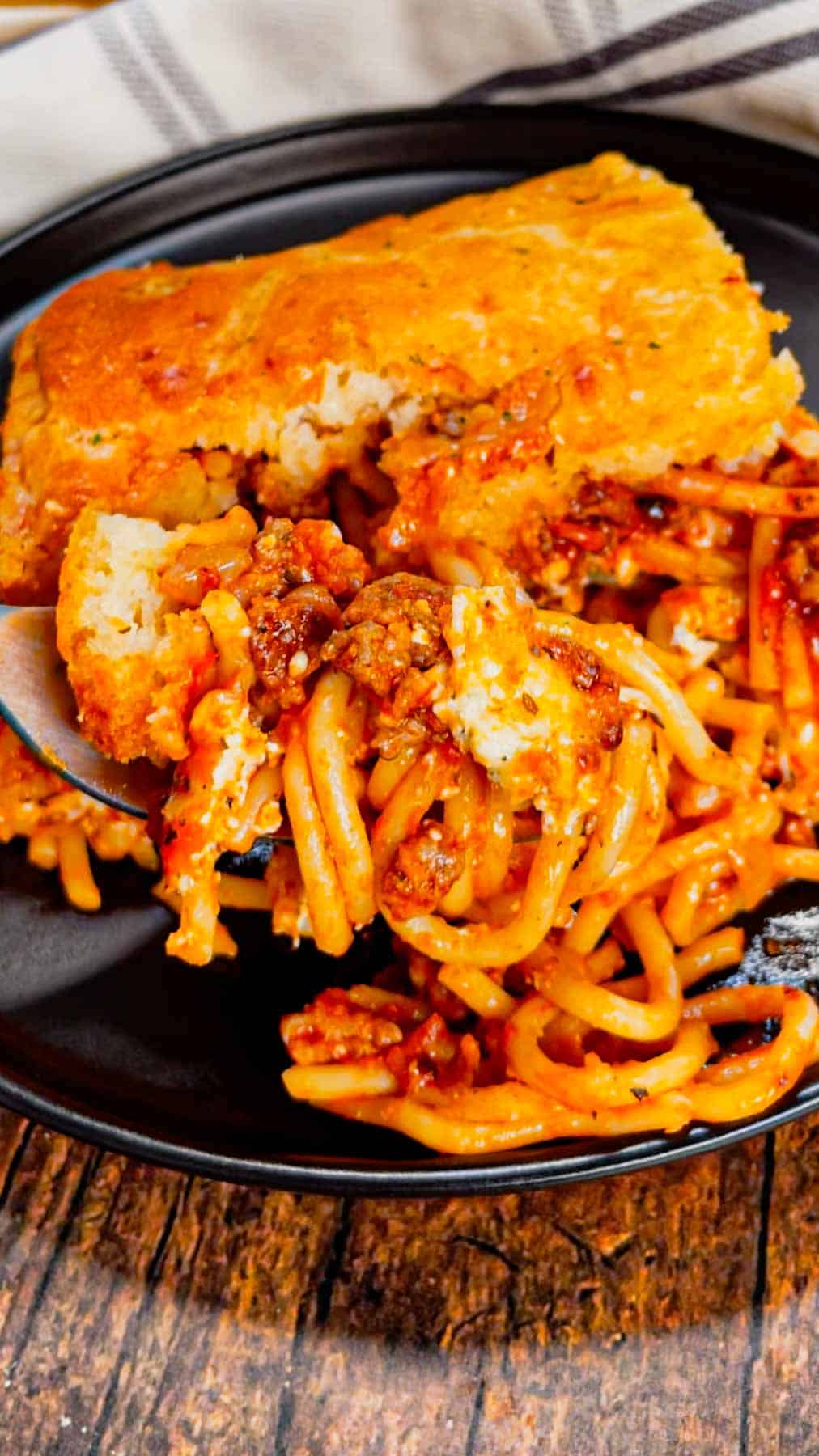 Take your comfort food game to the next level with this Cheddar Bay Spaghetti Casserole—where rich, cheesy pasta meets the buttery, garlicky goodness of those famous biscuits in one irresistible bake!

This hearty casserole is loaded with ground beef, marinara, ricotta, mozzarella and spaghetti noodles all topped with an irresistible fluffy layer of Cheddar Bay biscuit.