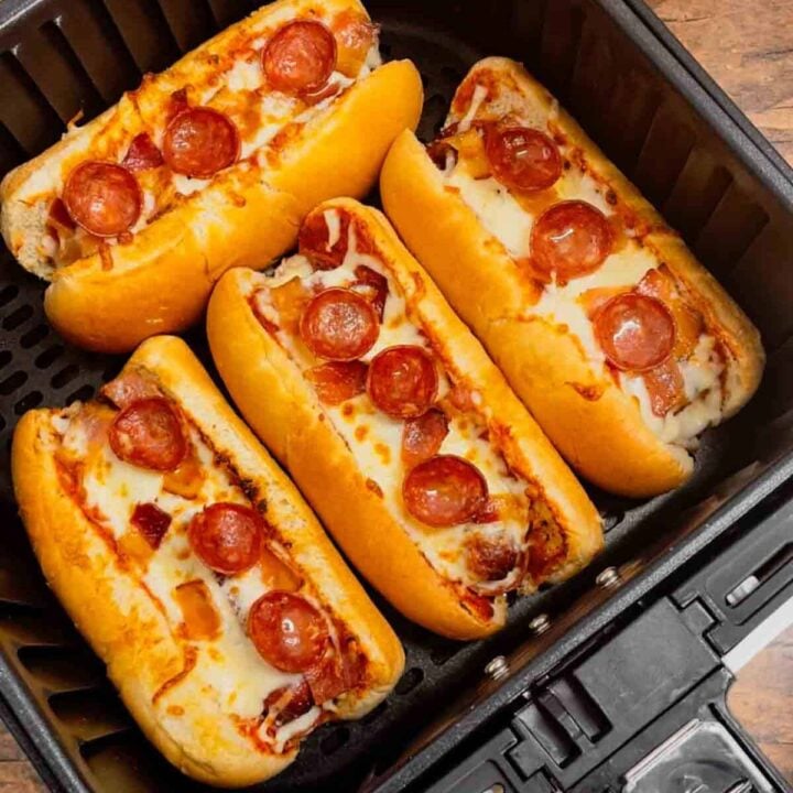 ir Fryer Pizza Dogs are a fun and easy recipe perfect for lunch or a quick weeknight dinner. These tasty hot dogs are loaded with pizza sauce, mozzarella cheese, pepperoni and bacon all air fried to crispy perfection.