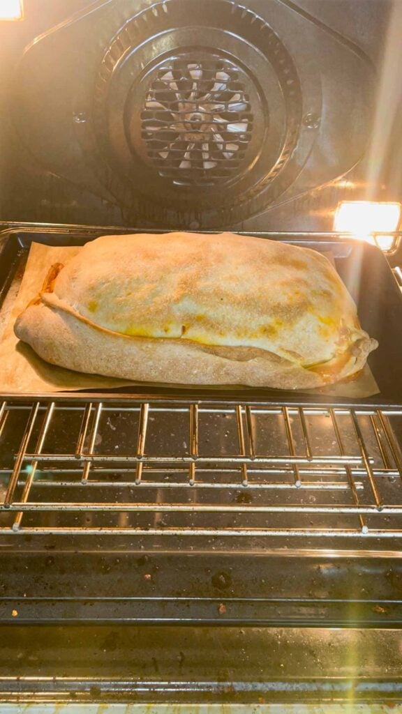 lasagna stuffed pizza dough baking in the oven