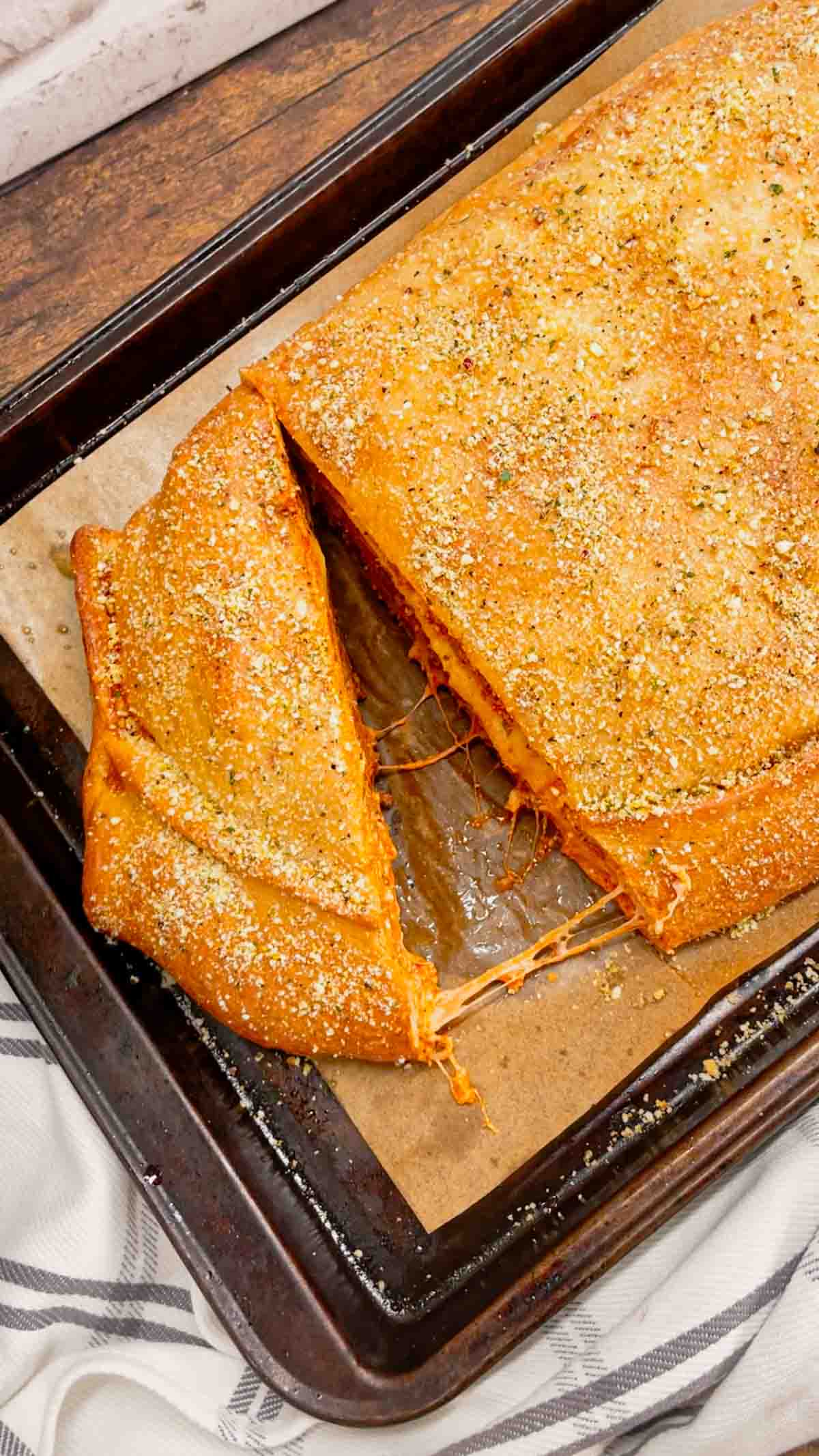 Lasagna Wellington is a fun twist on a classic lasagna that is sure to please the whole family. Pillsbury pizza dough is wrapped around layers of pasta, meat sauce and cheese and then baked until golden brown.