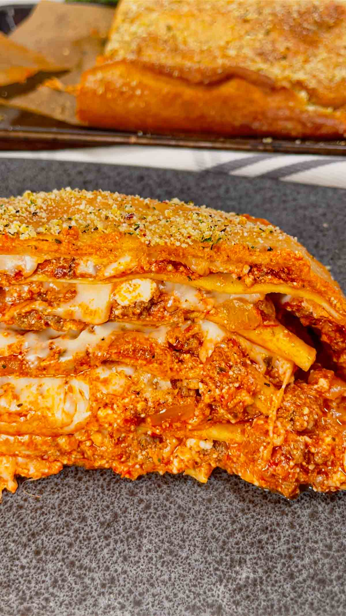 Lasagna Wellington is a fun twist on a classic lasagna that is sure to please the whole family. Pillsbury pizza dough is wrapped around layers of pasta, meat sauce and cheese and then baked until golden brown.