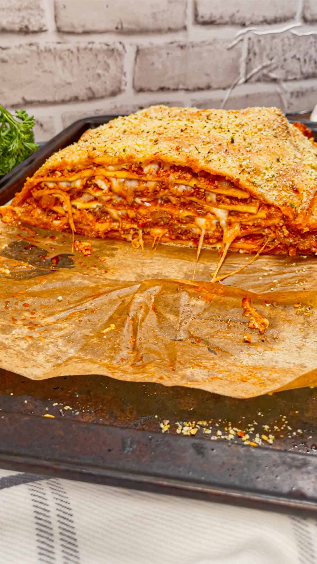 Lasagna Wellington is a fun twist on a classic lasagna that is sure to please the whole family. Pillsbury pizza dough is wrapped around layers of pasta, meat sauce and cheese and then baked until golden brown.