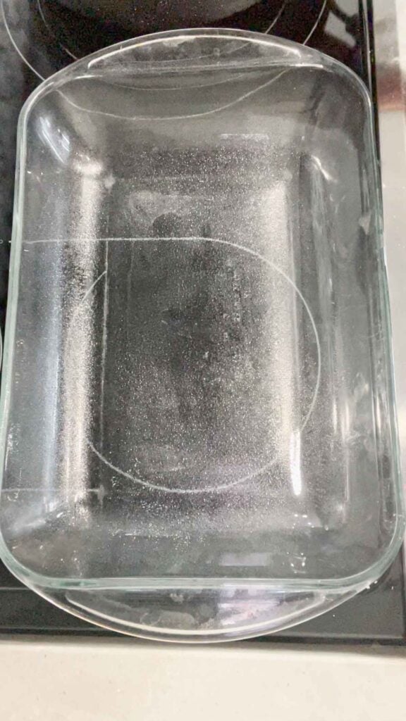 glass baking dish sprayed with cooking spray