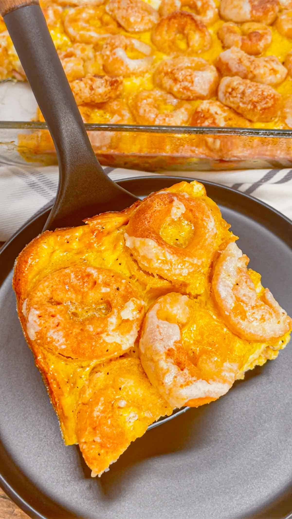 Mini Donut Breakfast Casserole is a fun and delicious brunch dish perfect for holidays and special occasions. This dish is loaded with sausage, ham, eggs, mozzarella cheese, store bought mini donuts and maple syrup.