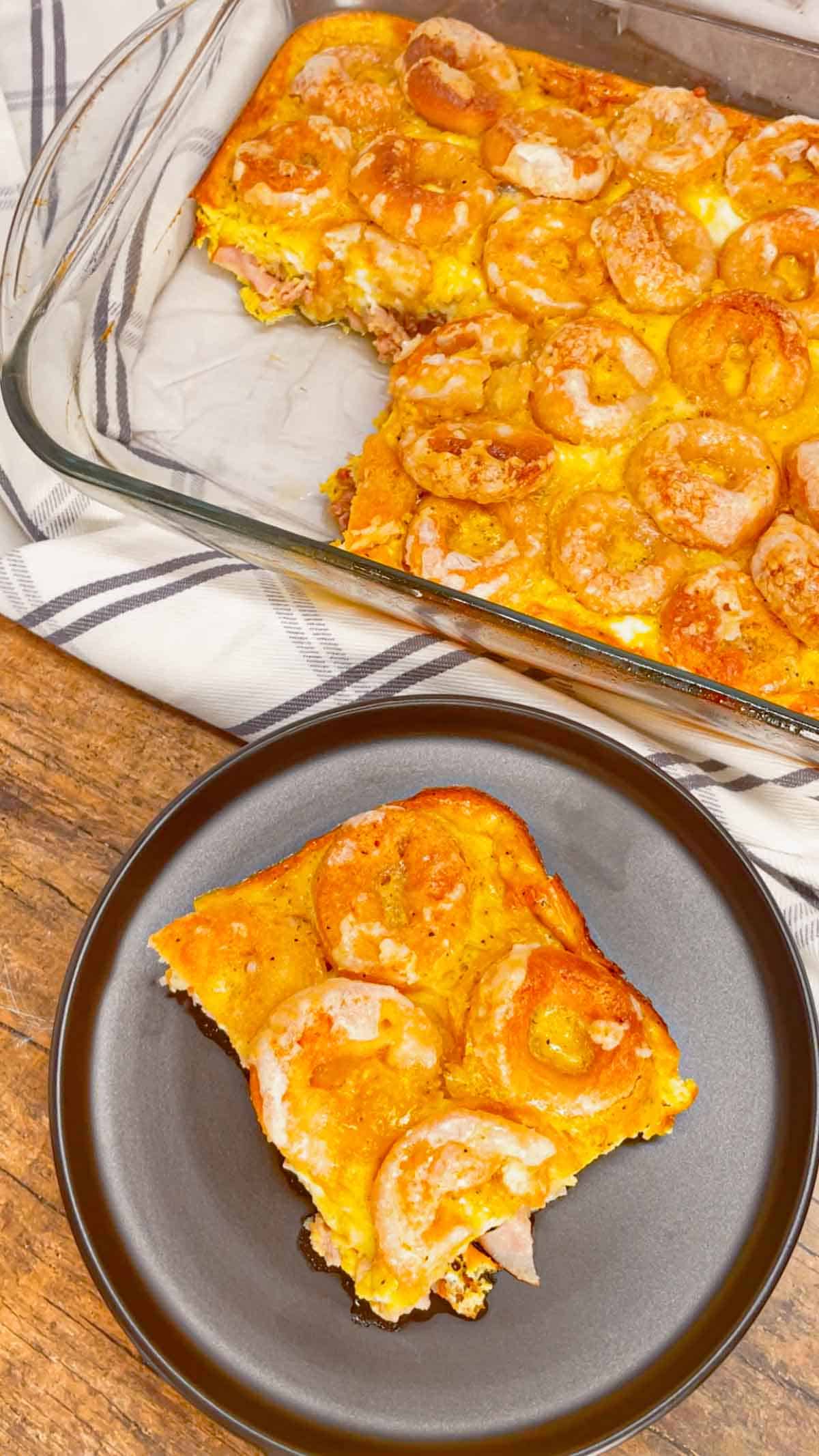 Mini Donut Breakfast Casserole is a fun and delicious brunch dish perfect for holidays and special occasions. This dish is loaded with sausage, ham, eggs, mozzarella cheese, store bought mini donuts and maple syrup.