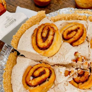 No Bake Cinnamon Roll Cheesecake is an easy dessert recipe perfect for any occasion. This rich and creamy cheesecake is flavoured with cinnamon and brown sugar and loaded with mini cinnamon rolls all in a graham crust.
