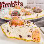 No Bake Timbit Cheesecake is a rich and creamy dessert recipe loaded with tasty donut holes. This cheesecake is made with a store bought graham pie crust and the cream cheese filling is loaded Tim Horton's chocolate and birthday cake flavoured Timbits.